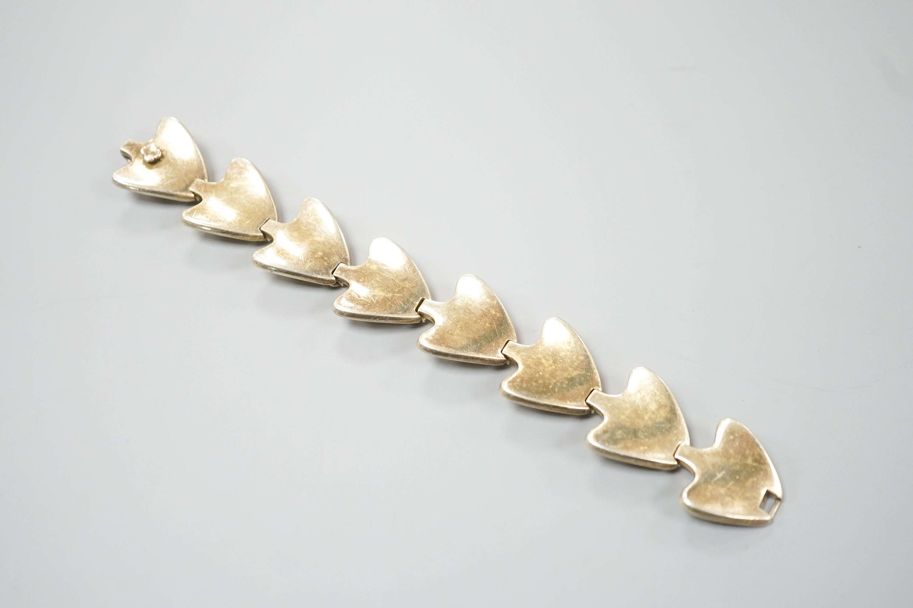 A 20th century Danish gilt sterling bracelet by Bent Knudson, 18.3cm.